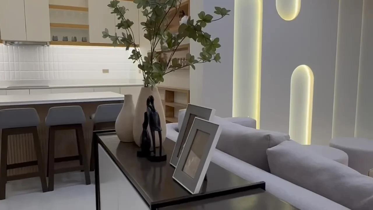 Styled kitchen, dining and living space by Istruktura